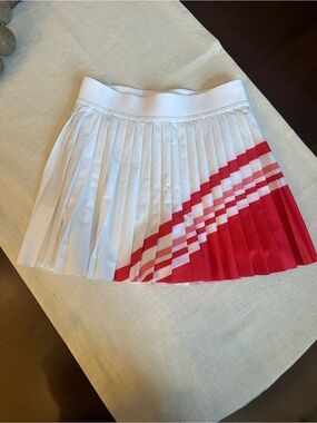 Athleta White Pleated Mini Skirt with Red Chevron Accent